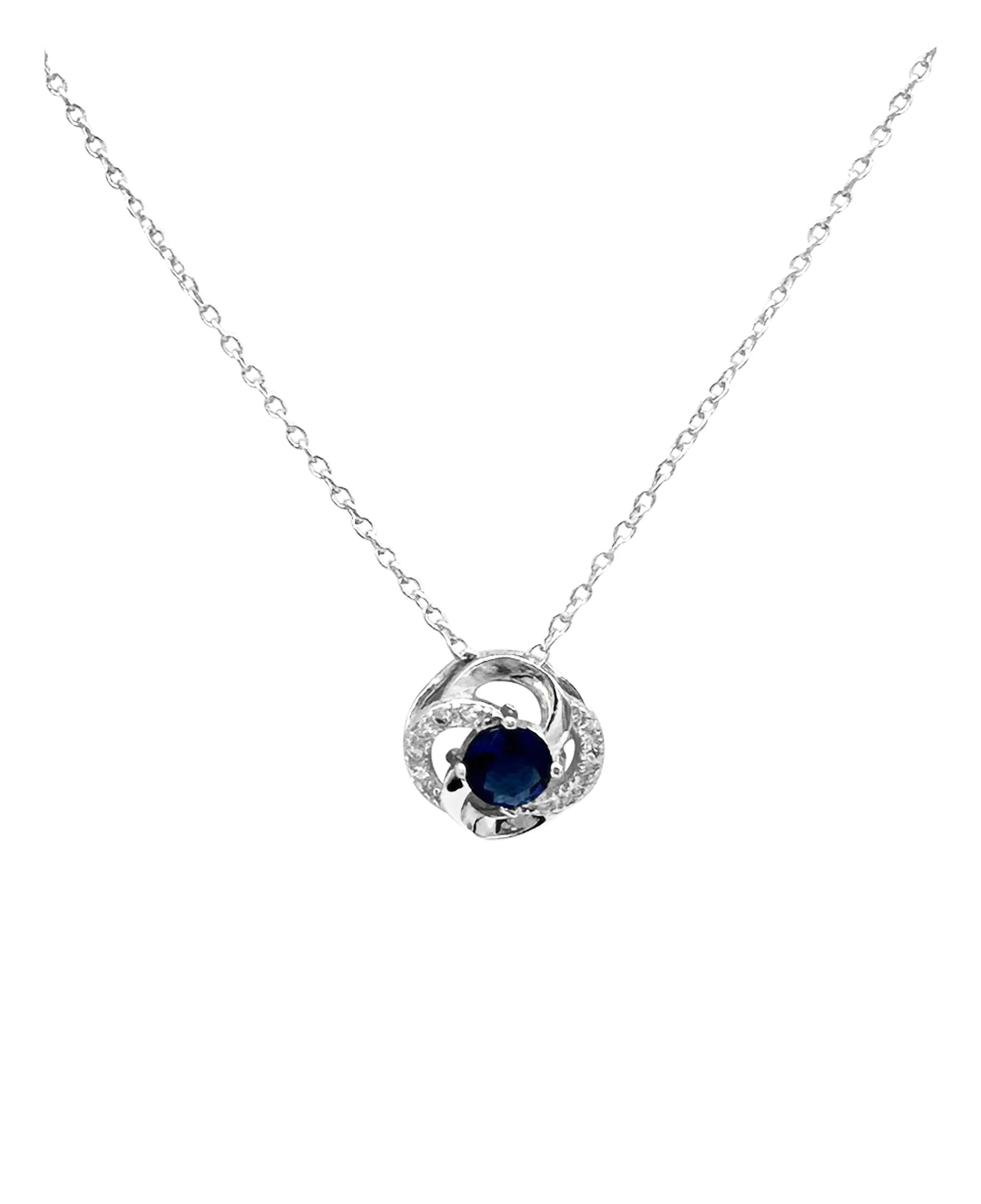 COLLIER EN ARGENT FLEUR AVEC PIERRES BLANCHES ET SOLITAIRE BLEU