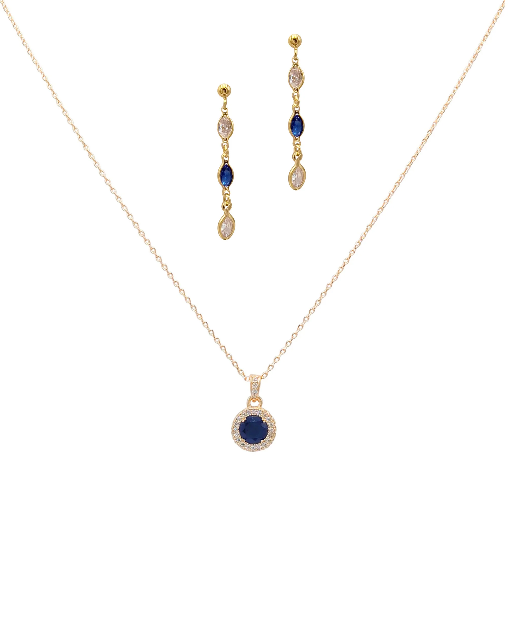 PARURE EN PLAQUE OR AVEC ZIRCONIUM SAPHIR